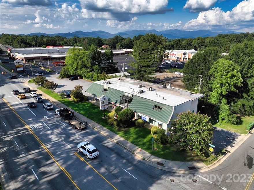 ATTRACTIVE SELLER FINANCING AVAILABLE.  This property is an incredible opportunity to purchase a stable, income-producing asset with +- 280 feet of frontage one of Asheville's busiest corridors.  It is centrally located, across from Biltmore Forest and adjacent to a grocery-anchored shopping center. It is a +- 12,400 SF building with 9 units, 8 tenants and a median tenant duration of 10 years.  Below market rents and high demand for the unit size and location offer significant upside potential.  Zoned HB which allows for a very wide variety of approved uses.
SEE BROCHURE FOR MORE DETAILS