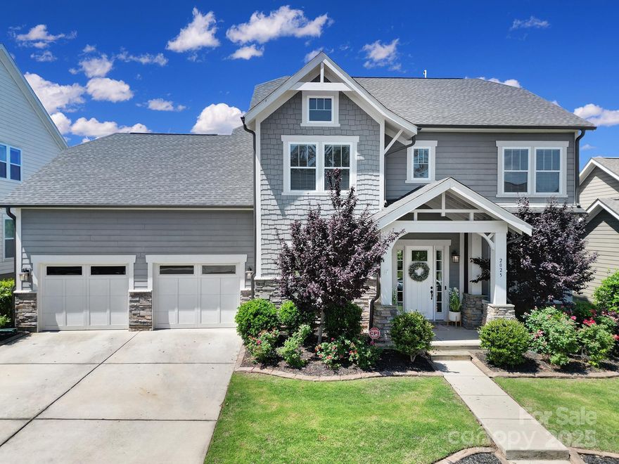 Welcome to the highly sought-after Masons Bend community of Fort Mill, SC! This stunning 4-bedroom, 2.5-bath home offers thoughtful design and upscale finishes throughout. The chef’s kitchen features quartz countertops, a large island with breakfast seating, stainless steel appliances, gas cooktop, wall oven/microwave combo, walk-in pantry, and a butler’s pantry. The main level includes a dining room with a custom accent wall, a spacious great room with gas fireplace, and a flex space ideal for a home office or playroom. Upstairs, the luxurious primary suite boasts a large walk-in closet, dual quartz vanities, a soaking tub, and a sleek tile shower. Three additional bedrooms share a full bath. Out back, enjoy the covered patio with stone-surround fireplace, fenced yard, and irrigation system—perfect for relaxing or entertaining. Community perks include a clubhouse, pool, trails. and pocket parks. Close to I-77, shopping, and dining—this home has it all! Schedule your viewing today!