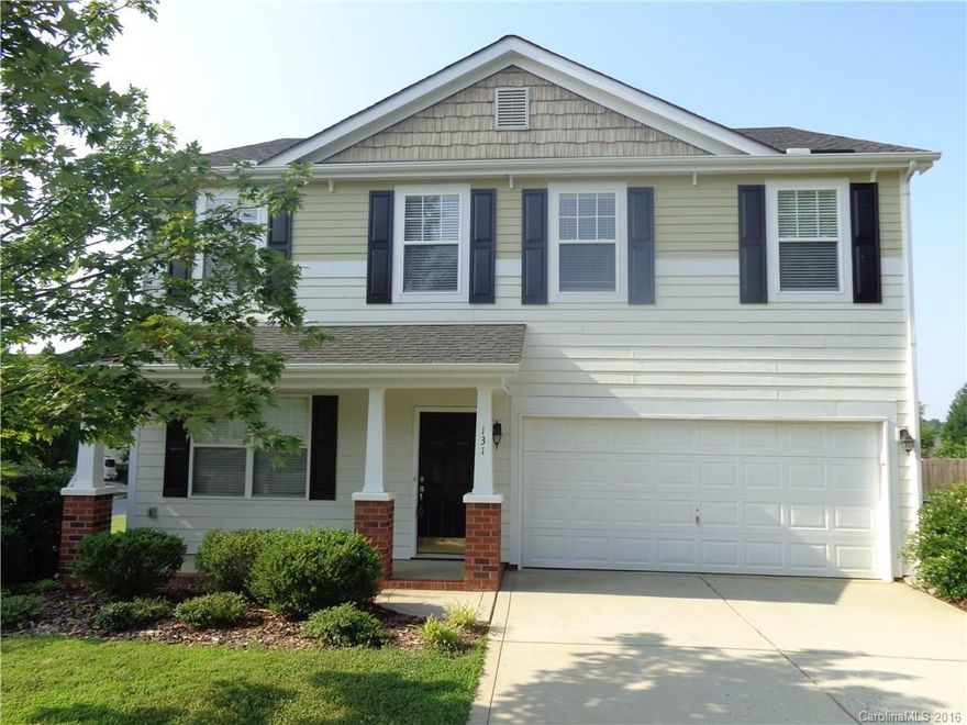 Beautiful spacious 4 bedroom 2.5 bathroom home has family room with fireplace, television nook, carpeting, formal living room, large dining room with wainscoting and upgraded chandelier. Kitchen with large cabinets, matching appliances, and master suite with dual vanity, soaking tub, and enclosed shower. This home is move in ready!