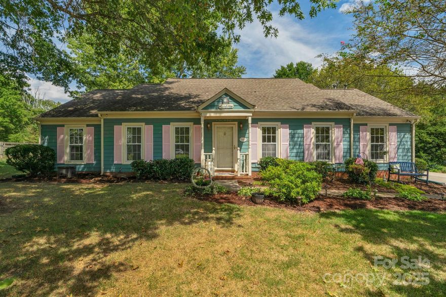 Beautifully maintained 1.5-story home in desirable Raeburn! With 2,002 sf of living space, this home offers 3 bedrooms, 3 full baths and a bonus room. The main level features a welcoming foyer, bright living and dining rooms, spacious family room with wood burning fireplace, and a well-appointed kitchen. The primary suite includes generous closet space and private bath, while two additional bedrooms, a full bath and laundry room complete the main floor. Upstairs, a large bonus room with full bath provides flexible living options. Outdoor living shines with an enclosed rear porch, expansive deck, and beautifully landscaped yard with storage shed. Great walk-in attic storage for added convenience. Community amenities include swimming pool, multiple playgrounds, sport courts and an athletic field. Ideally located with easy access to retail, dining, and major thoroughfares, this home blends comfort and functionality in a sought-after setting.