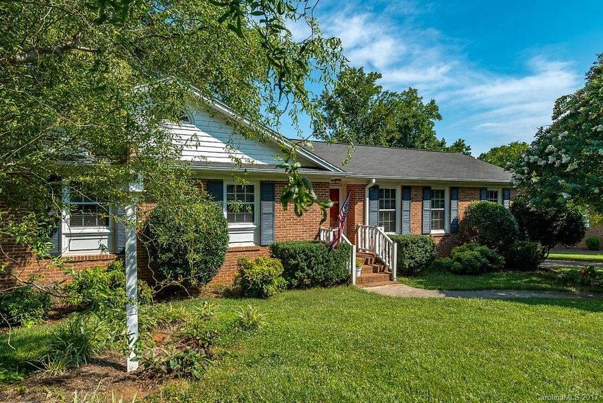 Beautiful neighborhood, lovely lot convenient to shopping, dining, & I-85. Updated kitchen, laundry, baths w/ 4-year-old AC & furnace. 1st-floor crown molding. 1st-floor & basement fireplaces w/ gas logs. Year-round, 300 sq.ft. sunroom w/ gas fireplace. Basement w/ single garage, 240 sq.ft. cooled/heated room, lots of storage, & electrically wired. Fully fenced back yard. Aerial & Virtual Tour at: http://tour.charlottedronecompany.com/tour/MLS/2317JeffersonAvenue_Gastonia_NC_28056_338_14868.htm