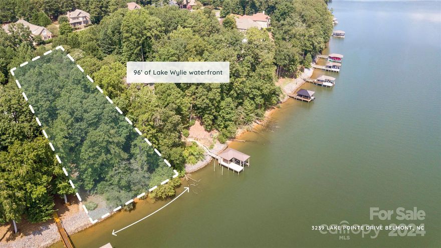 Prime waterfront lot in gated community! 96 feet of beautiful waterfont views of Lake Wylie! This lot is essentially main channel, not in a small/tight cove. Community offers clubhouse, pool, beach, paved walking trails, tennis courts, waterfront pavilion, fountains, and much more. Community is approx. 30 minutes from uptown Charlotte.  25 minutes to Charlotte Airport. Just 10 minutes drive from downtown Belmont which offers great restaurants, pubs, breweries, shopping, and more.
