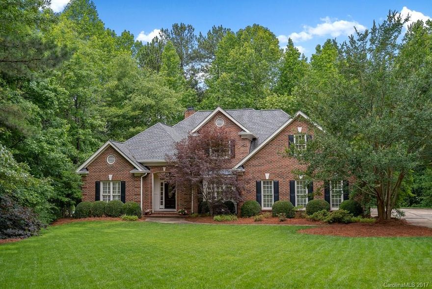 Spectacular private waterfront home on the pristine Mountain Island Lake!  Enjoy the outdoors sitting on the covered porch looking at the waterfront or take a stroll down to the dock and enjoy the beautiful scenery.  This incredible home features: an open floor plan with beautiful built-ins and a fireplace, granite counter tops, stainless steel appliances, hardwood floors throughout the downstairs, master bedroom on the main, huge walk in closet and so much more.