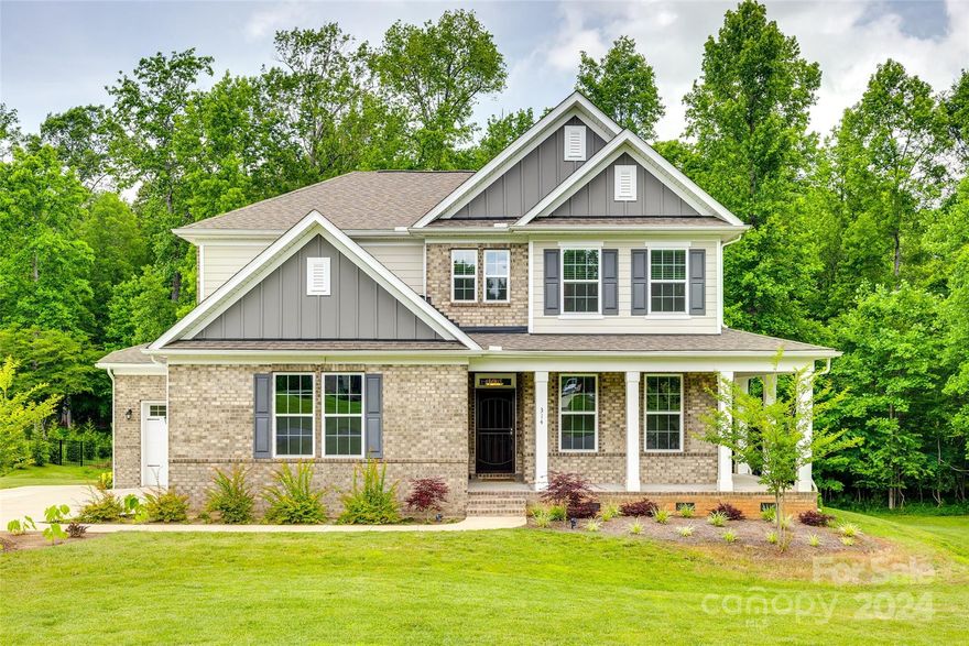 Discover your dream home in the highly sought-after Larne Glen subdivision! This beautiful 4 bedroom, 2.5-bathroom residence offers a custom-like design and is situated on a rare, private cul-de-sac lot with 4.02 acres of serene and tranquil woods. This open floorplan features a primary suite on the main floor  complete with large soaking tub, separate tiled shower and large walk-in closet. Laundry room is conveniently located on the main. On the 2nd floor you’ll find 3 spacious bedrooms plus a separate loft and bonus room perfect for a home office, playroom or extra guest space. The inviting dining room features coffered ceilings, adding a touch of elegance. Gourmet kitchen is equipped with a gas range, double ovens and a 7-foot island, ideal for culinary enthusiasts. Additional features include a large walk-in attic perfect for storage, side entry 3-car garage, charming wrap-around porch and a covered back deck with peaceful wooded views. No HOA.