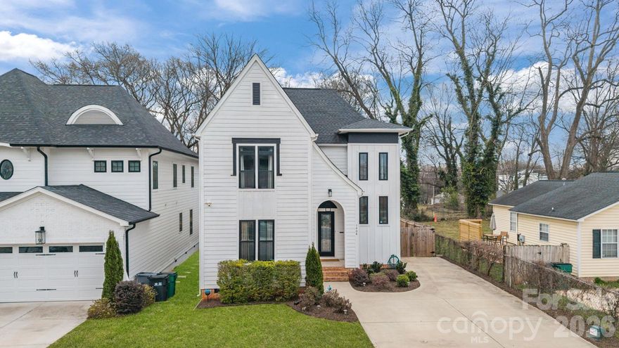 Experience refined living in the heart of Optimist Park, where Optimist Hall, the Light Rail, NoDa favorites, and local breweries are just moments away, paired with effortless access to all that Plaza Midwood and Uptown Charlotte have to offer. Impeccably constructed and thoughtfully designed, this residence showcases an open-concept floor plan. The custom craftsman kitchen is a true centerpiece, featuring bespoke cabinetry, an expansive accent island, stainless steel appliances, a walk-in pantry and abundant storage. The seamless flow into the dining and living areas extends to a covered walk-out deck and patio with a striking see-through gas fireplace, overlooking a large, private, and fenced in backyard retreat with a large shed for additional storage. The main-level primary suite offers a luxurious escape, complete with an oversized walk-in shower, dual-sink vanity and a custom-designed walk-in closet.  Finishing the custom feel of the first floor is five-inch crown molding. On the upper-level, you will find a spacious flex living area, a private en-suite bedroom and two additional bedrooms connected by a Jack-and-Jill bath, adorned with custom tile work. This is truly sophisticated urban living without compromise!