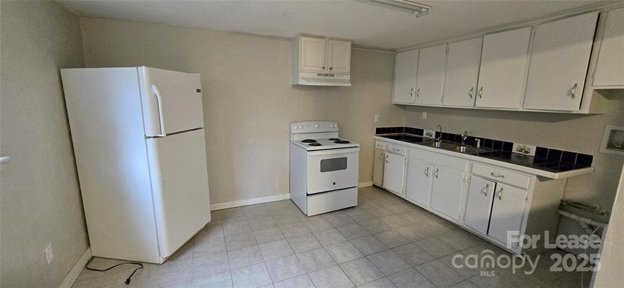 Downstairs apartment in a duplex. Has two bedrooms, one bathroom, washer and dryer hookups. All tile flooring. Small dog or cat allowed with pet fee. Unit is accessed by a flight of exterior steps.
