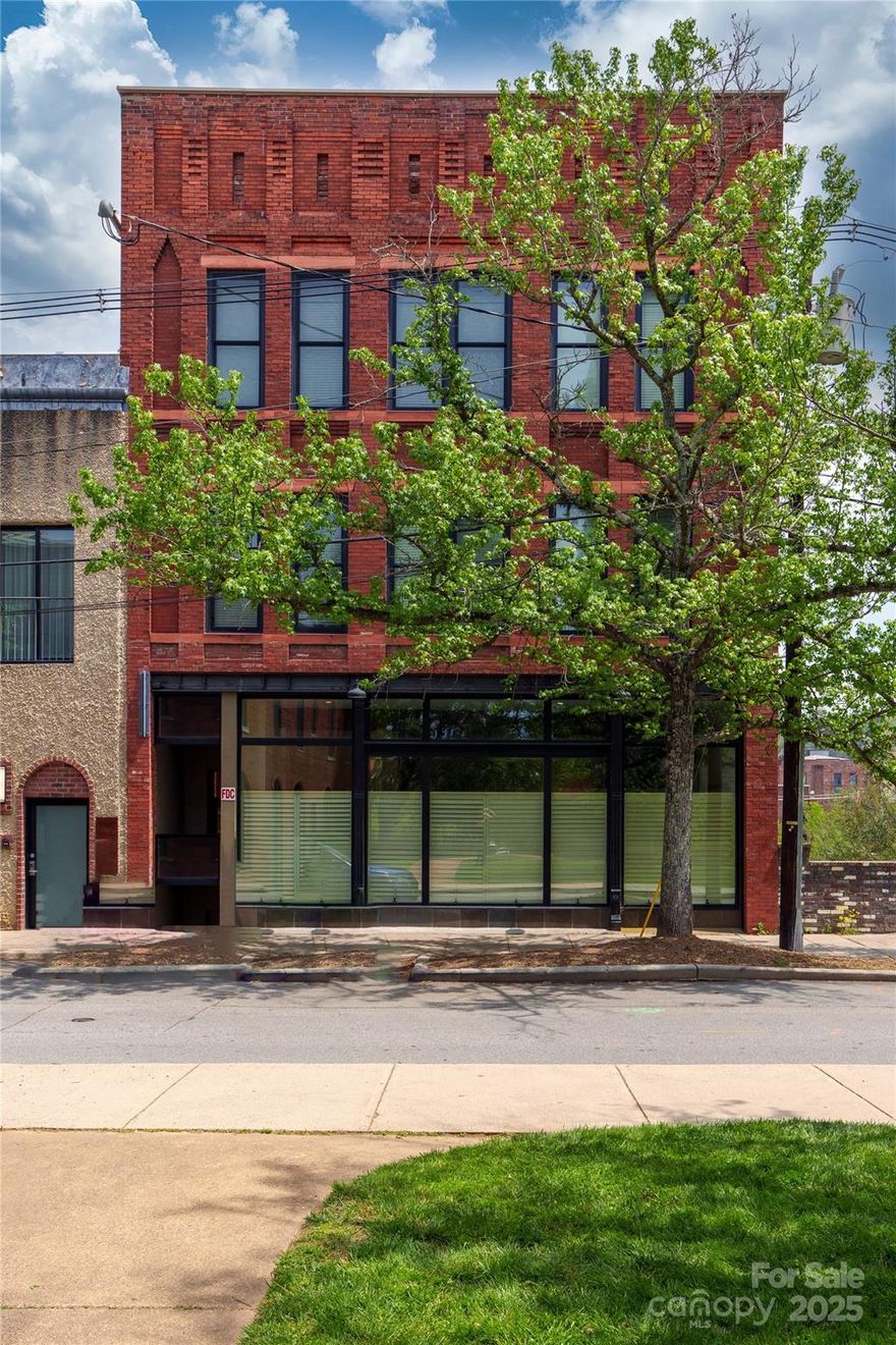 $1 million price reduction!! Seller financing.  Stunning 8-unit/14-room short term rental investment opportunity. Situated on coveted Church St, an urban oasis in the heart of thriving downtown Asheville. Turnkey - fully furnished with kitchens and laundry in every unit. All FF&E, website conveys. Awarded the prestigious Griffin Award in 2010 for outstanding historic preservation. Potential to convert to partial owner-user or individual condos. 1895 restored historical elements uniquely blended with modern amenities and style. Fully sprinklered. Elevator serving all floors. A rare downtown Asheville opportunity to purchase an entire building purposely designed for short term rental use. See marketing brochure for details.