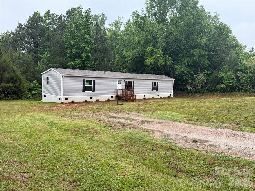 Like New! 2024 Clayton Manufactured Home Approximately 1140 Sq Ft, Living Room, Eat in Island Kitchen with Stainless Range, Side By Side Refrigerator with Water and Ice, Dishwasher, Lots of Storage Space, Laundry Room with Folding Counter-Cabinets, Primary Bath/Bedroom with Dual Sinks Vanity, Tub/Shower Combo, Walk in Closet, Central Heat and Air, Permanent Foundation, Private Well and Septic, 1.67 Acres, Nice!