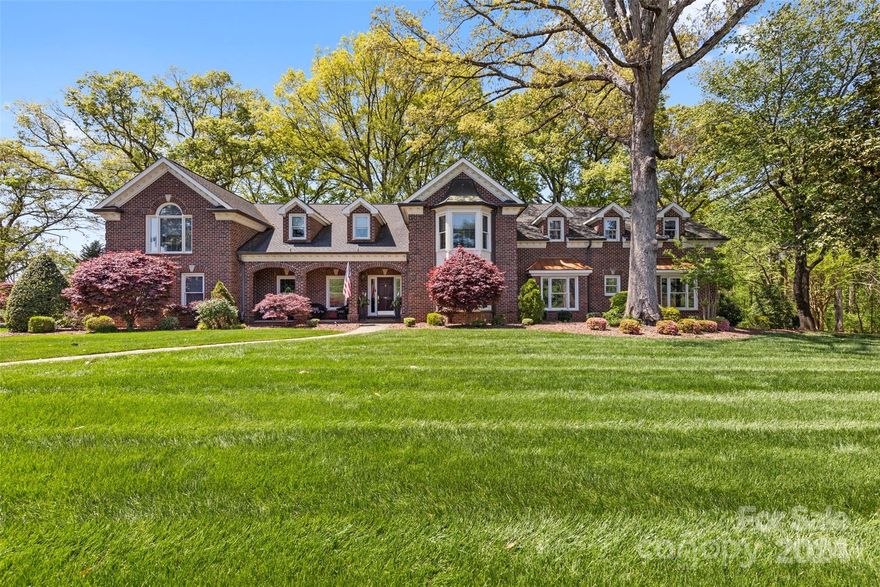 Stunning luxury estate in the heart of Statesville. The expansive property offers over 8,000 square feet of heated living space, 6 bedrooms, and 6.5 bathrooms. The main level features 3 bedrooms, including one ensuite bedroom, a media room, a library, a formal dining area. Chefs kitchen with new stainless appliances, granite, and gas cooktop. The spacious second level primary suite has a private balcony with hot tub, a gas fireplace, and a newly renovated spa-like bathroom. Upstairs also features an in-law suite with a living area, full kitchen, and half bath. Sitting on over 2 manicured acres, this home offers a private backyard oasis with heated pool, hot tub, pool house with full kitchen, fireplace and seating area, a spa-like full bath with rain shower, lower level patio, gas lanterns and a hand-laid pool deck. Upgraded finishes and ornate trim work throughout. 3 car garage with epoxy floors and Mahogony doors. Contact listing agents for full features list.