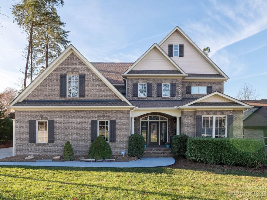 Must see brick 4-bedroom, 3-bath home in highly desired Treetops at Cowans Ford!  Luxurious main floor with primary bedroom, hardwoods, gourmet kitchen, formal dining room and a spacious two-story Great Room. Office with french doors and ample closets can easily serve as a 5th bedroom. Upstairs you will discover 2 additional bedrooms, a spacious bonus room/bedroom and loft that provides stunning views. Outdoors the back deck leads to a patio with a firepit and hot tub. This home is overflowing with extras such as NEW carpets, gorgeous light fixtures and so much more! Extensive updates throughout including: 2023 Trane heat pump and hardwood flooring, 2022 primary full bathroom remodel. See features/improvements doc for complete list. Conveniently located between Denver and Huntersville off Hwy 73, 7 miles to Birkdale. Join Cowans Ford Golf Club for Golf, Swimming, Tennis, Pickle Ball and lake access by private boat ramp/dock.
