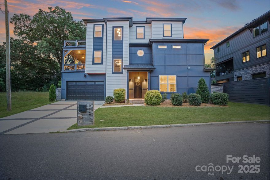 Sophisticated and design-forward, this contemporary 3-story single family home offers rare form and function just minutes from Uptown Charlotte. Clean architectural lines, quartz countertops, custom cabinetry, designer tile, and hardwoods throughout reflect a curated, turnkey experience. The open-concept main level with wet bar and fireplace sets the stage for effortless entertaining. The versatile layout offers lofts and flex spaces for a home office, fitness studio, or retreat. The spa-like primary suite elevates daily routines. The thoughtfully scaled, private back patio and two decks allow for less maintenance and create the perfect setting to host, relax, or simply enjoy the skyline backdrop from a front-row seat to it all. Two-car garage parking and no HOA offer freedom and convenience—an uncommon combination in this location so close to the city. Walk or bike to coffee shops, parks, breweries, and vibrant city life.