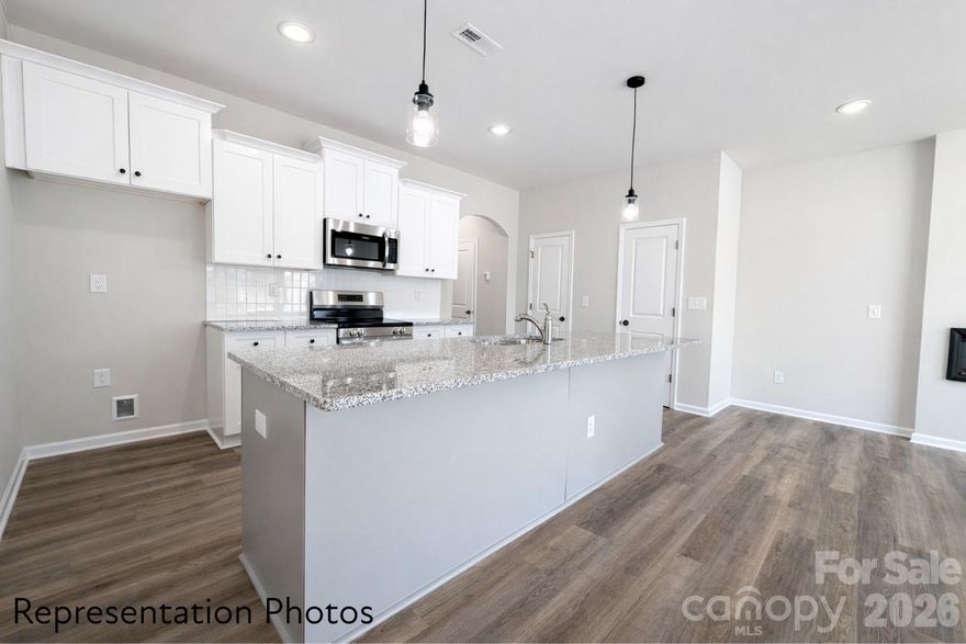 To-Be-Built, Completed in July 2026! END UNIT! The builder is offering great incentives paired with our awesome preferred lenders. Just a few more week left to pick out your preferred interior color package, at no additional cost!  Which color package do you like best? If you prefer a closing date that is further out, we have more homes coming and we can match the best fit for your timeline. This is a beautifully designed 3 bedroom townhome with a thoughtful layout and upscale finishes included in the price. This is our popular Whitley plan AND features a large kitchen island that overlooks the main living, dining, and flexible space—perfect for entertaining and everyday living.  Homes feature timeless selections and natural tones throughout. Luxury vinyl plank flooring runs through the main living areas, all full bathrooms, and the laundry room for both style and durability. Upstairs, you’ll find spacious secondary bedrooms and a conveniently located laundry room, making daily routines effortless.   Each townhome includes a 16-foot privacy fence separating units, with potential HOA approval to extend fencing after purchase—allowing homeowners to create an even more private outdoor space. A perfect blend of modern design, transparency in pricing, and low-maintenance living—Abershire offers style, comfort, and value in a brand-new community. All of the homes are representation photos.