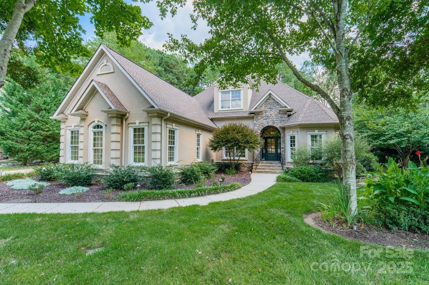 Welcome! Custom built, luxurious dream home in beautiful Sailview! Gorgeous 4 bd, 3 1/2 bath sits on Sailview's BEST interior lot;  private, flat, cul-de-sac location & OVER 1 ACRE near green space. Screened porch leads to large deck and to patio w/Saltwater POOL, waterfall and reservoir. LARGE PATIO for entertaining, stone counter, w/built-in grill and 'fridge! Fenced backyard for pets! Inside, is a large kitchen, pantry; lovely stone fireplace in LR, custom bookshelves, crown molding.  12'4" ceilings in Foyer, LR, Dinning rm. Gourmet kitchen w/ granite ctrs., & keeping room. Spacious primary bdrm. on main has ensuite bath with whirlpool & 2 walk-in closets. 2 more bdrms. & full bath on main. Upper, lrg. theater room w/ book cases & upper level holds a very large bedroom with full bath. Come see & make it yours! Floors are lightened. Clubhouse, tennis, pool. Add'l floor area of 123sf 5’ sight line on upper. Near Lake Norman. Broker owned Property