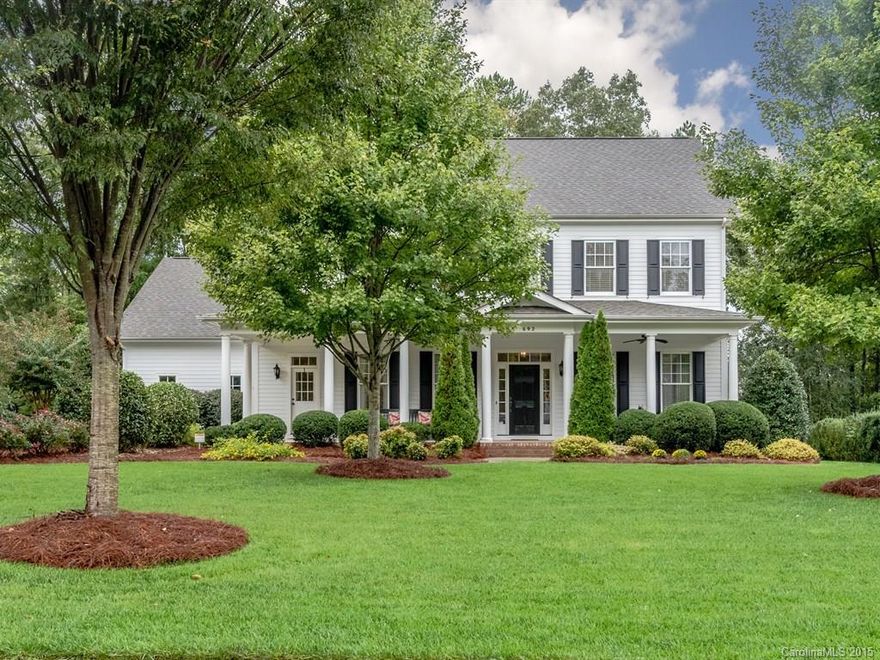 Quintessential Beauty & Elegance with this Home with Screened Porch and Wrap Porch! Set in the highly sought after Springfield neighborhood, featuring: dark, rich hardwoods, wainscoting, transom windows, butler’s pantry & mud room. Gorgeous GOURMET Kitchen w/custom cabinetry, tile back splash, granite, SS appliances & wine cooler, gas cooktop, & double oven. Luxurious Master Suite w/vaulted ceiling. Bedrm/Study on main. Fabulous Bonus or Rec/Play Rm. Lush landscaping & extensive paver patio.