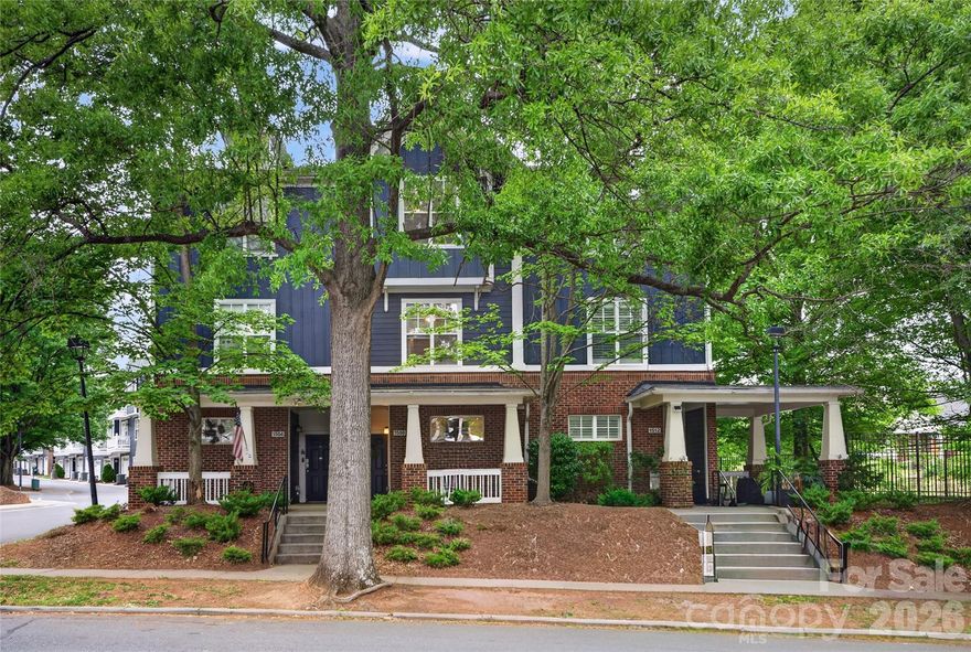 Amazing city views from this stunning Wesley Heights townhome style condo! Highlights of this home is that each of the three bedrooms has their own private bathroom...plus a half bath for guests!  As you walk in, the lower level features a bedroom with an ensuite bath as well as garage access through the entry hall. On the main floor, you walk into the dining room that leads to the kitchen complete with breakfast bar, lots of cabinets, stainless steel appliances and access to the private back deck.  The large living room has great views of Uptown and is very spacious! Upstairs you will find two more bedrooms! Enjoy city views from the primary suite as well as the double closets.  The private bath features double vanities and an oversized garden tub. The other upstairs bedroom gets great evening light and has its own bath as well!  New carpet has just been installed and the home was repainted too!  All of this and more within feet of the street car stop to take you Uptown or over to Midwood.  Enjoy not having to drive to a concert or game! Not to mention all the great bars and restaurants in the sidewalk lined historic neighborhood of Wesley Heights and all the new spots in Freemore West. A short drive gets you anywhere, 2 minutes to I-77, 3 minutes to Uptown, 8 min to SouthEnd.  Seconds to Stewart Creek Greenway. HOA covers water and trash as well as community maintenance.