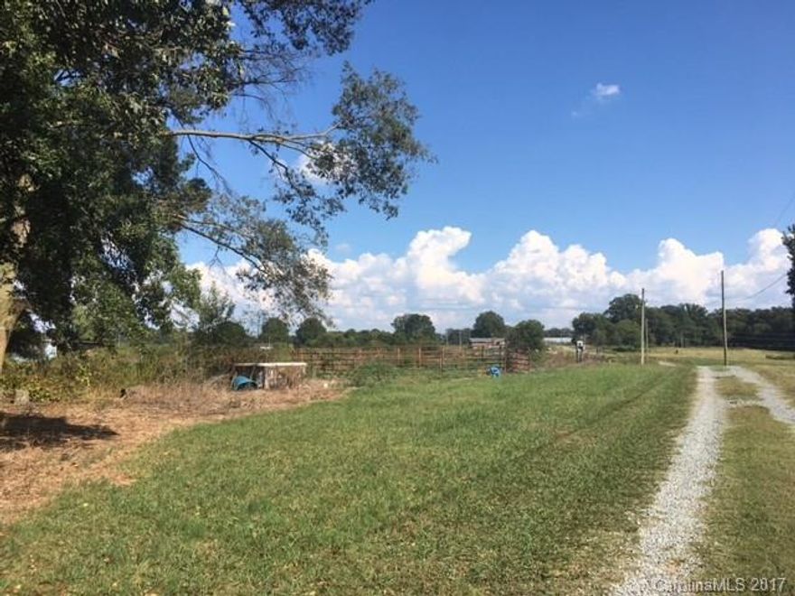 Enjoy the perfect country living only minutes from Unionville and Monroe NC and the perfect commute to Charlotte business district. This 1+ Acre  is ready to go with power and septic system in place home. This property is situated perfectly on this property of flat cleared land. Adjoining 12 acre and 2 acre parcels also available. Call agent for more details.