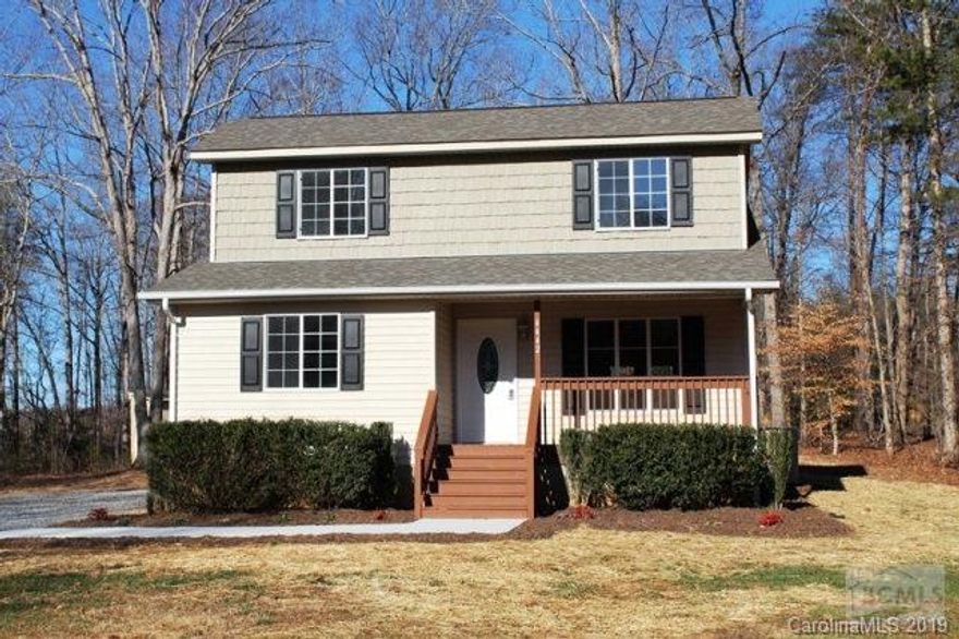 Completely renovated 3BR, 2.5 BA on nearly one acre with two outbuildings and new roof and heat pump. Beautiful kitchen features new cabinets, stainless appliances, granite countertops and tiled backsplash. Dining room opens up to large back deck. New flooring, fixtures and paint throughout. Large master bedroom w/ walk-in closet and master bath w/ double-sink vanity and granite counter. Great laundry room w/ extra cabinets. Mature trees provide lots of privacy. Agent/owner.