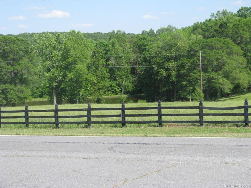 This lot can be all you want it to be.  Farm is 42 Acres, but can divide into 10+ Acre lots to suit your needs.  Great pasture fenced for horses.  Nice pond with woods or all pasture w/ stream.  Located in scenic area with Clover Schools.