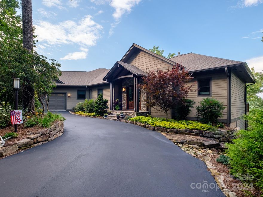 With spacious rooms & soaring 20-foot vaulted ceilings, this home perfectly captures the elegance of mountain living. The open floor plan includes a large kitchen, dining area, & living space that flows seamlessly onto the screened porch. The screened porch & private Jacuzzi deck off the primary suite offer a serene view of Lake Ticoa. Live comfortably on the main level, featuring a generous primary suite & an office both with stunning lake views. When guests arrive, the lower level provides two guest bedrooms with en suite bathrooms while the upstairs office easily converts into a bedroom with a Murphy bed. The owners combined two lakefront lots to create a 1.2-acre estate with 350 feet of deepwater frontage. The home, perched at the top of the lot, offers breathtaking views, while a short walk down leads to the dock, where you can swim in crystal-clear waters or launch your kayak. Golfers will enjoy the golf simulator in the basement! https://www.youtube.com/watch?v=xZQIatjAcKM