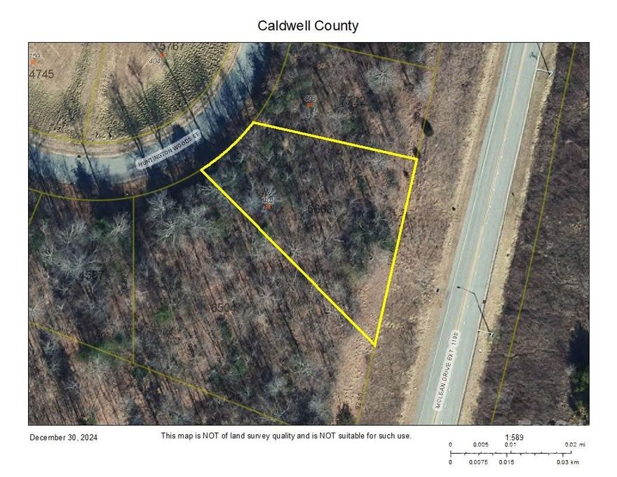 The breathtaking beauty of Grandfather Mtn & long-range views of Western NC greet you as you enter the subdivision of Huntington Woods North.  Build your dream home with ease as underground utilities including water, sewer and electric make building a breeze! Located in Lenoir, NC this lot offers a convenient location that is close to shopping & healthcare while just 22 miles South of Blowing Rock & the Blue Ridge Parkway and just over an hour to the Charlotte airport!