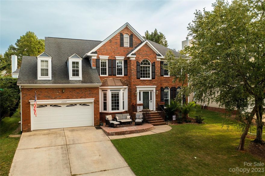 Lake Norman community with your own deeded boat slip! This spacious gem, walking distance from the community pool, tennis courts, and boat slips, invites you to embrace lake life in this prime Corneilus location. The main level boasts an office, dining room, and updated kitchen seamlessly connecting to the family room and all-season outdoor patio.  The spacious kitchen features center island including room for stools, pantry, stainless steel appliances and nook area. Upstairs, find well-appointed bedrooms, including a primary suite with spacious walk-in closet, attic storage, and a spa-like ensuite. The extended outdoor patio overlooking the tierd yard is a perfect place to entertain or enjoy meals outside.  Relax on the front patio and soak in the lake views.  Enjoy proximity to amenities, local dining, shopping, high-rated schools and easy access to hwy 77. Don't miss the chance to call this your home - schedule a private showing today!