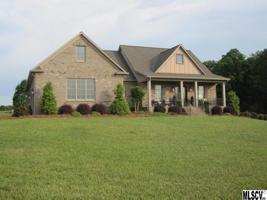 Meticulous attention to detail is evident thru-out this custom all brick home.  Ceilings are 10-12 feet thru-out with coffered ceiling in the living room.  Interior finishes include hardwood floors, gas logs, central vac, ample storage and spacious bedrooms, gourmet kitchen open to the living area with custom cabinetry.  Command center with large laundry.  Full basement includes finished bedroom and bathroom.  Bedroom does not have windows.  Septic is for 3 bedrooms.  Workshop in basement.