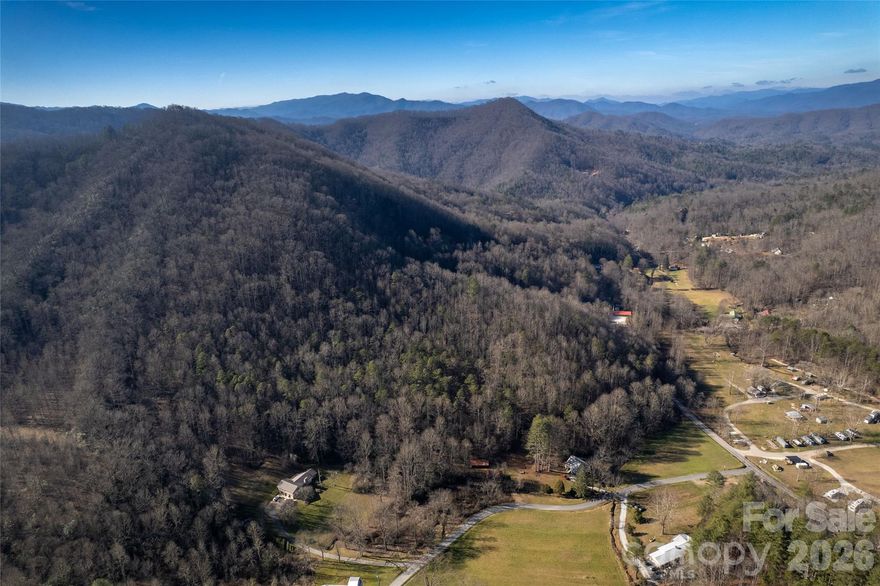 9.64 Acres in East Alarka – Bryson City, NC | Mountain Views & Build Sites. Discover 9.64 acres of mountain land in the desirable East Alarka community of Bryson City, NC. This property offers gentle slopes, multiple build sites, and a ridge-top location with spectacular valley views. Approximately 5.5 acres of usable land, unrestricted except for no manufactured homes. Perfect for a single dream home or multiple residences. Well and septic needed. Conveniently located 6.5 miles from downtown Bryson City, close to Great Smoky Mountains National Park, Fontana Lake, and Nantahala Outdoor Center. Enjoy privacy, flexibility, and breathtaking scenery—ideal for your mountain retreat or investment property.