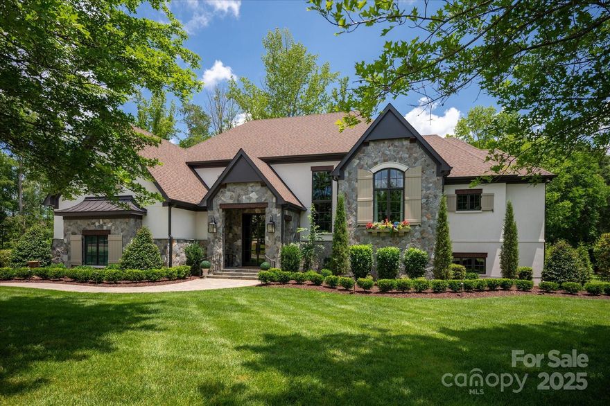 Beautiful newer construction home (built in 2023) in popular Skyecroft community located on very private lot with amazing finishes and upgrades. This home exudes classic elegance from the custom double doors to the tastefully designed ceiling details and moldings. Bright open floor plan features an amazing kitchen with 9 foot island with extra thick quartz tops, custom ceiling height cabinetry, 6 burner gas cooktop and Monogram double ovens with elegant French doors. Kitchen also includes a spacious scullery with sink, microwave and loads of additional cabinetry for storage. Up one half level, you will find a stunning private office with custom built in cabinetry, vaulted ceiling and great views of the outdoors. The second level features the primary suite with coffee bar + spa like primary bath and oversized walk in closet with well designed custom cabinets. 2nd floor also includes 3 additional secondary rooms, each with a walk in closet and attached full bath + a large bonus room. The best part of this amazing home is the lower level (not basement!) which is an entertainers dream! It includes a light and bright rec room that opens to the outdoor terrace and includes a beautiful custom bar with convenience fridge, sink and dishwasher that has a pass through window to the terrace. Lower level also includes a home gym! Perfect for your heavy equipment! Outside, take in the great North Carolina weather on the beautiful covered terrace which also features a gas fireplace. Or relax in the luxury salt water plunge pool with water sheer on the lower level or the expansive travertine patio. So many GREAT features in this beautiful home. One of the best floor plans you will ever see!