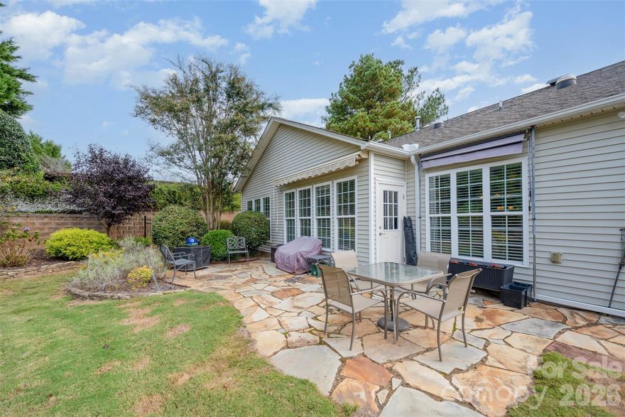 2026 - MONTHLY HOA DUES DROP TO $321. Welcome to your sanctuary! This stylish home offers the perfect blend of functionality and style. The open floor plan features modern touches and an abundance of natural light. Nestled on a peaceful cul-de-sac, this property boasts thoughtfully designed living spaces, pre-finished hardwood floors throughout, and offers a functional flow suitable for both everyday living and entertaining. The kitchen is equipped with granite countertops, ample cabinet space, updated appliances, and an informal dining area. The open-concept layout centers around a spacious great room with a cozy gas fireplace. The bright sunroom is seamlessly connected to the family room and leads out to the custom patio. The beautifully landscaped backyard with a pond and waterfall is the perfect place for morning coffee and entertaining. Carolina Lakes is an amenity-rich active adult community that offers two outdoor pools, one indoor pool, an exercise facility, woodworking/stained glass studio, pottery studio, billiards, clay tennis courts, pickleball, shuffleboard, bocce, hiking trails, and over 160 interest groups and clubs. Come and enjoy your retirement in this beautiful and easy-to-maintain 3 bedroom home in the resort-style Del Webb community of Sun City Carolina Lakes. The premier 55+ community.