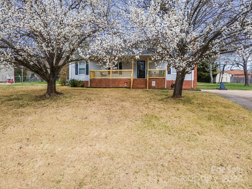 Welcome to your beautifully updated single-family home in the heart of a quaint small town! This charming residence boasts three bedrooms, two bathrooms, and a host of recent upgrades, including a brand-new porch that enhances both curb appeal and functionality. As you step into the large living room of this cozy home, you are immediately greeted by a sense of warmth and comfort. This well-maintained property boasts two sheds, offering ample storage space for tools, equipment, or outdoor gear. With spring quickly approaching, you will be able to enjoy the large entertaining space that the back patio provides. Conveniently located near local shops, restaurants, and parks, this home offers the perfect blend of small-town charm and modern comfort. Don't miss this opportunity to make this your forever home!