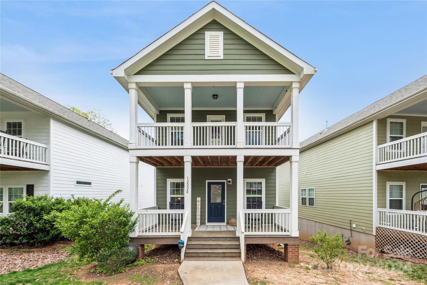 Welcome to this charming Charleston-style home in Vermillion! Located just minutes from the quaint downtown Huntersville and just 1 mile from I-77, this home boasts 4 spacious bedrooms, and 4 FULL BATHROOMS for the ultimate comfort and privacy. Step outside onto one of 3 DECKS, including a private deck off the primary suite, perfect for enjoying morning coffee or evening sunsets. Inside, you'll find a beautifully appointed kitchen with granite countertops and stainless steel appliances, and the refrigerator does convey. The open floor plan seamlessly connects the kitchen to the living and dining areas, featuring hardwood floors that add warmth and character.  Downstairs a fully finished basement offers additional living space and includes a full bath, ideal for guests or as a recreational area. Don't miss the opportunity to own this exquisite property in one of Huntersville's most desirable neighborhoods!