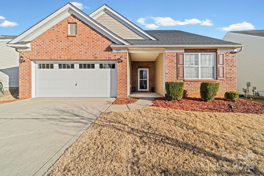 Experience exceptional one-level/ranch style living with this beautifully maintained, truly move-in-ready 3 bedroom, 2 full bath home, with 2 Car Garage, that welcomes you the moment you step inside with its bright, open, and inviting atmosphere. Two spacious bedrooms are thoughtfully placed at the front, while the private primary suite is tucked away in the rear, creating an ideal and functional layout. The kitchen flows seamlessly into the den, highlighted by a soaring vaulted ceiling that keeps you connected with family and guests as you cook or entertain, complemented by a newer stove/oven perfect for all your culinary adventures. Just steps away, the back patio invites you to enjoy peaceful mornings or lively gatherings, and with lawn maintenance included, you can spend more time relaxing and less time mowing. The expansive, newly fenced white-vinyl backyard offers a private outdoor retreat ideal for entertaining or unwinding. Perfectly situated near shopping, restaurants, Novant Health Medical Center, and with quick access to I-485, plus just minutes from the exciting new Clear Creek Crossing, this home places convenience at your doorstep. Community amenities including a pool, clubhouse, recreation areas, and a playground make the neighborhood just as appealing as the home itself.