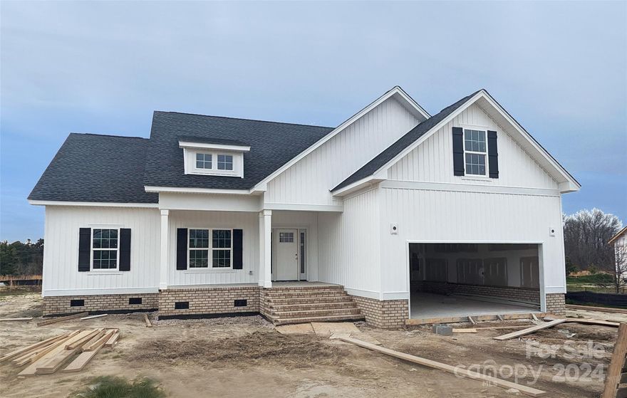 Homes by Christopher! Welcome to 1308 Philbeck Rd., York, SC Quality new construction by a reputable and seasoned builder, 29745! This 3/4 bedroom and 2 bath open floor plan home is dressed to the nines with high- end finishes and sits on 2 acres. (See Spec sheet in Associated docs) Build out a micro farm and enjoy your chickens or garden till your heart’s content. Cook in the beautiful kitchen with a work island that opens up to a spacious dining area. The covered rear porch provides a peaceful and relaxing space to enjoy the outdoors. This spectacular home has luxury vinyl plank in main living areas and granite in kitchen and bathrooms. Overall, the home offers comfort, style, and functionality and is ideal for anyone looking for their own comfortable living space. NO HOA!