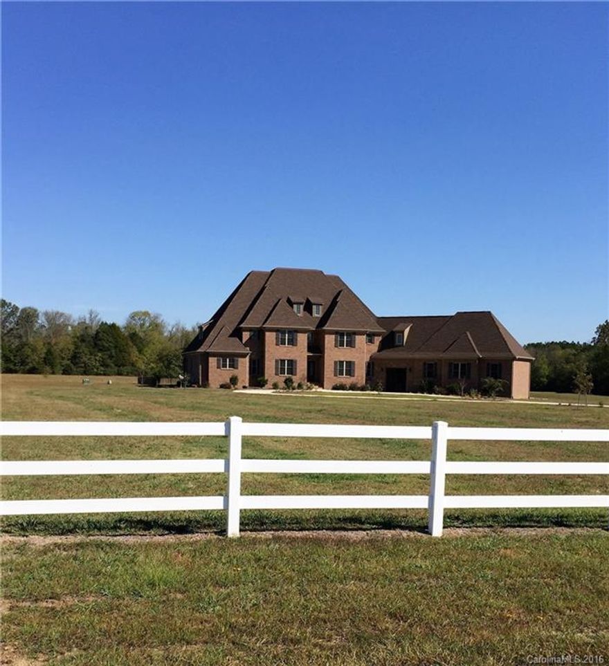 Appraisal on file for $995,000 and priced below tax value ($927,500)
Looking for a wonderful country estate? This almost new home comes with 23.73 acres suitable for horses, etc. With 6720 heated sq ft, huge covered patio overlooking pool, wonderful cooks kitchen, tons of granite, hardwood flrs, 3 car garage, and a Theatre Room! Each bedroom has it's own private bath. House has foam insulation and more upgrades. COME & SEE!