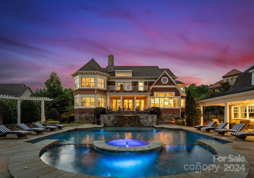 The Award Winning "Hamptons Haven" home is now available!! Masterful design and modern luxury are uniquely embodied in this 7 bedroom and 6.5 bath estate located in Charlotte’s exclusive gated country club community The Palisades. This stunning home offers high ceilings, huge Chef’s kitchen with sub-zero appliances, working pantry, natural walnut wide plank wood floors, and one of the largest residential elevators you’ll come across. The detached carriage home is the ultimate entertainment house with 2 guest bedrooms, 2 full baths, full size washer and dryer. Entertain your guest in the great room with high ceilings, billiards room and a full bar with sub-zero appliances and 2 wine coolers that hold up to 300 bottles! Double sliding glass doors open to your private backyard oasis with a large swimming pool, spa, outdoor fireplace and multiple water fountains. Hydraulic car lift to transfer with sale.
