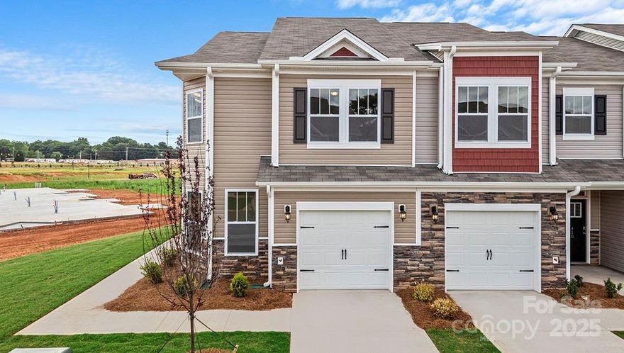 Enjoy simple living with our new construction townhomes! This end unit offers an open floorplan to seamlessly blend the living area, dining room and kitchen. The kitchen is complete with pantry, ss appliances, tile backsplash and island. With three bedrooms, 2.5 baths as well as loft area, this townhome has space to meet all of your needs! *Home features are subject to change without notice. Internet service not included. Sq footages are approximate*