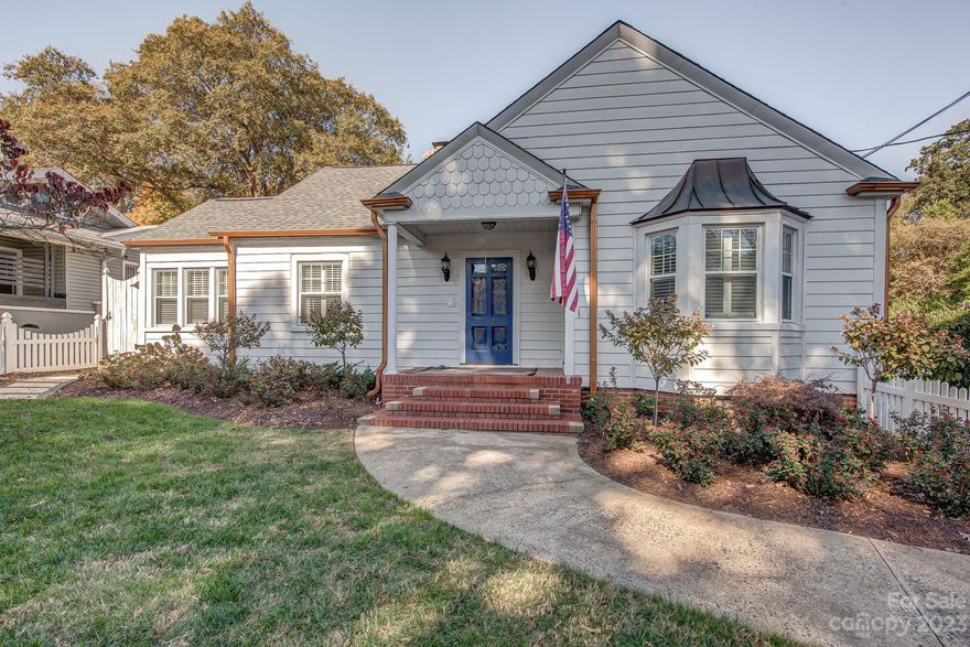 Charming bungalow w white picket fence in the Historic District of Downtown Belmont is ready to welcome you HOME! Immaculately maintained, 3 bed 2.5 bath, single-level home is over 2500 sq ft & has been beautifully updated. Panoramic glass doors bring the fabulous outside entertaining area "inside". Private backyard offers an over 800 ft of travertine w granite countertops, cedar pergola, professional landscape lighting, 36" Coyote Pellet Grill with match fridge and sink, & a fenced yard. Bedrooms w walk-in closets & hardwood floors. Both full baths recently updated. Primary Bath is a dream w claw foot soaking tub, huge shower, breathtaking mirror & vanity. Incredible kitchen w/ Wolfe gas range, wine cooler, walk in storage & built-ins in breakfast area. Rooms wired for TV wall mounts in three areas, category 6 Ethernet in office Detached garage & expansive driveway for extra parking. 50amp Breaker tesla charger in garage. Walking distance to downtown & 20 minutes to Charlotte airport.