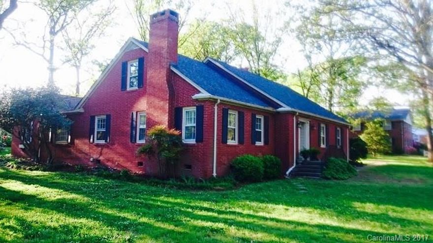 Gorgeous brick 3 bed 2 bath Cape Cod home located in the established Forrest Hills community! HUGE corner lot that anchors the entire block overlooking Azalea Park. Large beautifully remodeled kitchen, new appliances and remodeled master bath. Upstairs attic is floored and could be transformed into a master suite or comfy loft. Large shaded yard with endless possibilities to create the PERFECT outdoor living space. Walking distance to Downtown Albemarle's restaurants and shops. A MUST SEE!