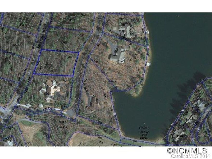 Mountain Living at its best in Burlingame. Great gentle slope building lot in Burlingame on Lakeshore Drive.  Across the street from the lake and near the golf course.  Enjoy golf, croquet, tennis, swimming, fitness, dinning, and more in this mountain country club setting with club membership available.  Burlingame Community enjoys the Horse Pasture River with a riverside community park for fishing and picnics.