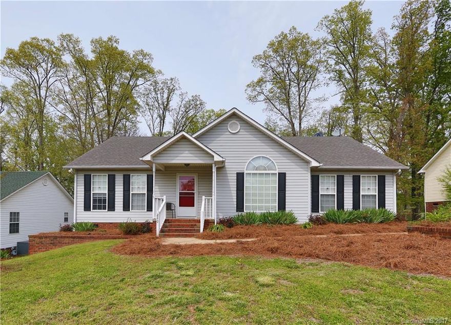 Welcome home to this freshly painted ranch style retreat featuring a split bedroom plan, vaulted ceilings, and more! Lots of details including bead board, crown molding and a tray ceiling! Enjoy evenings on the deck overlooking the natural wooded area! Tackle the yard work and keep your tools in the wired building! This one is waiting for you to call it home! It won't last long!