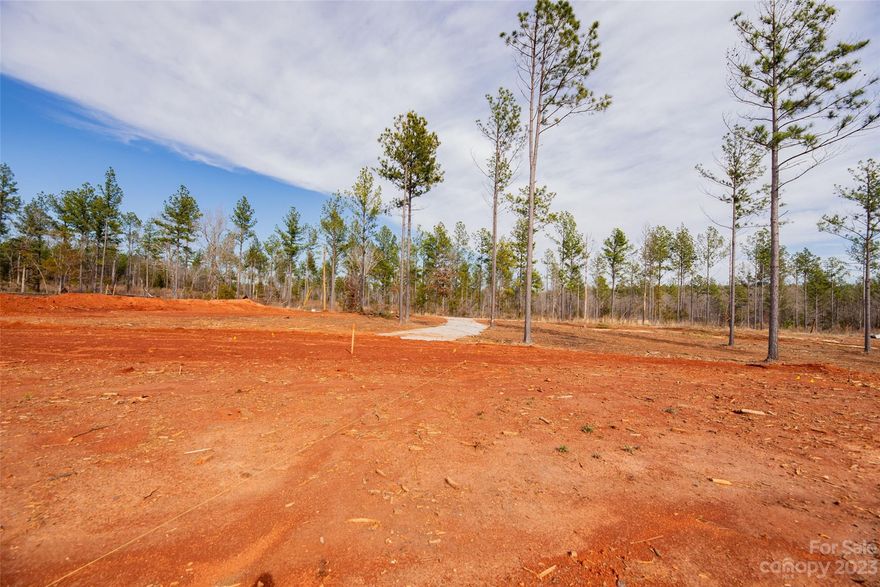 This is one of the best lots on the street! This 2.73 acre lot is mostly cleared, graded and ready to go. Septic approval has already been obtained for a FOUR BEDROOM home. This is a great location... within minutes of Waxhaw.
