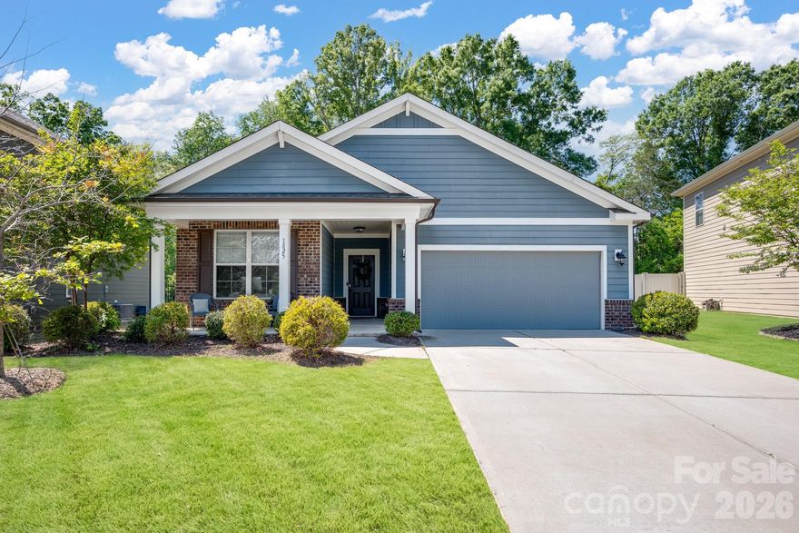 Beautiful ranch home with desirable open floor plan and upgraded finishes in a prime location near Ballantyne! Enjoy outdoor living on the covered front porch or entertain on the extended patio overlooking a private, fenced backyard that backs to wooded views. Interior features include high ceilings, crown molding, and chair rail detailing. Spacious great room with gas fireplace flows seamlessly into the dining area—perfect for entertaining. Gourmet kitchen includes granite countertops, large island, staggered cabinetry, soft-close drawers, stainless steel appliances, and a walk-in pantry. Split-bedroom floor plan offers added privacy, with a spacious primary suite featuring dual vanities, oversized walk-in shower, and large walk-in closet. Generously sized secondary bedrooms. Convenient to Ballantyne, South Charlotte shopping, and dining.