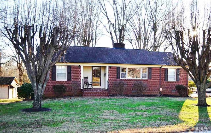 Immaculate all brick home with full basement, this home has 3bd/ 3baths (1 in basement), gleaming hardwood floors, fresh paint, newer roof, tile floors and tub surrounds in the bathrooms, updated light fixtures, plumbing fixtures, bathroom cabinetry. In the kitchen you have granite counter tops, tile backsplash, tile floors, and the stove, dishwasher, refrigerator, and microwave all remain.  Seller says there is hardwoods in living room under carpet. The basement just had a a fresh coat of paint on the floor. The roof on the front of the house was put on in 2011 and the roof on the back of the house was put in late 2016.  3 lots makeup the 1.03 acres that is included with the home. Detached garage would be great workshop.  attached carport.