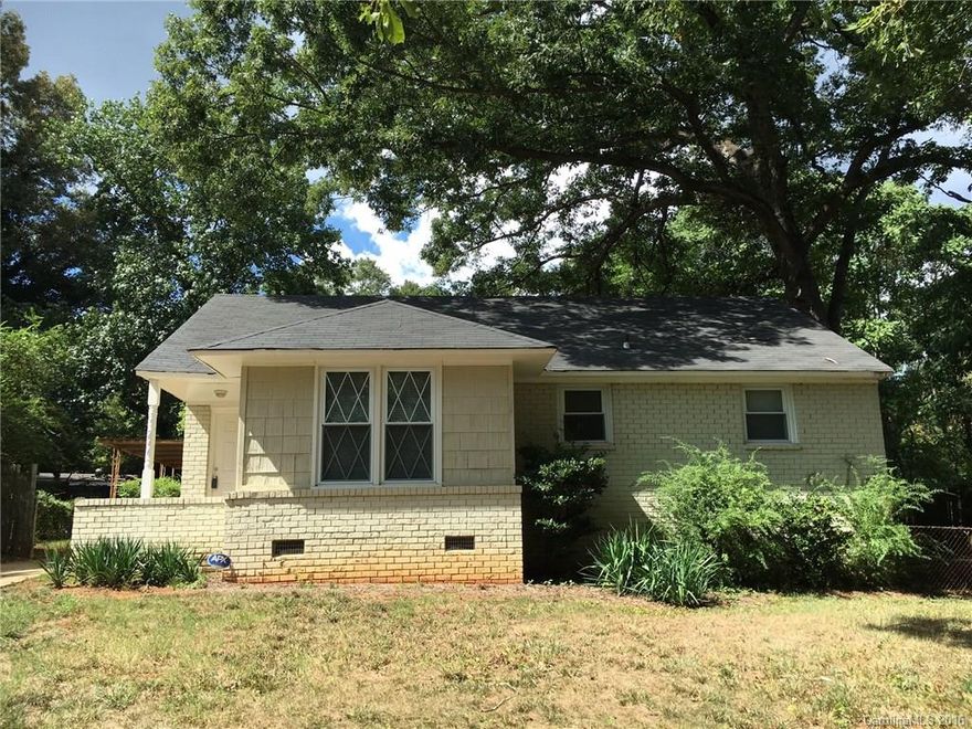 All brick ranch home nestled in Southwest Charlotte.  Affordable home with carport, mostly fenced yard and high lot.  New roof in 2012.  Great opportunity.