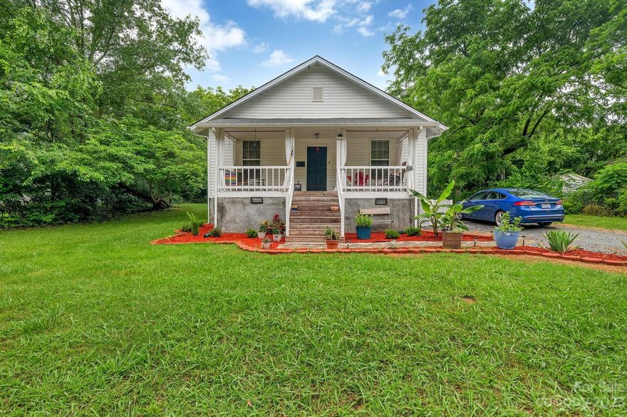 Built in 1920, this adorable, fully renovated home is in what was once the Esther Mill village. The neighborhood is showing signs of revitalization with several new construction and renovated homes nearby.   The bright kitchen features contemporary finishes to appeal to today's modern preferences; granite countertops, white subway tile, and stainless steel appliances. There is vinyl plank flooring in an open floor plan with special touches throughout. The primary suite boasts a sliding barn door with walk-in closet and laundry room attached. Both full baths have tile floors and subway tile tub surround extending to the ceiling!  Close to: Shopping & Restaurants, Shelby City Parks, Royster Memorial Golf Course (6 minutes), Deer Brook Golf Club (8 minutes), Catawba Two Kings Casino (21 minutes), Charlotte –Douglas Airport (41 minutes), County Courthouse (3 minutes), Broad River Greenway (31 minutes)