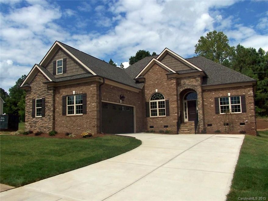 Full brick, courtyard home leaves nothing on your wish list. This home features a 4 bedroom 3 1/2 bath split bedroom plan. Great room with 14 ft coffered ceilings and stone fireplace. Master bath with large tiled shower and 6 ft whirlpool tub. Granite tops throughout. Huge upstairs bonus/bedroom 4 with full bath. 18 x 8 garage door accommodates any vehicle. The kitchen features SS Samsung appliances. Attention to detail throughout this beautiful home. Best location and hidden gem in Rock Hill!