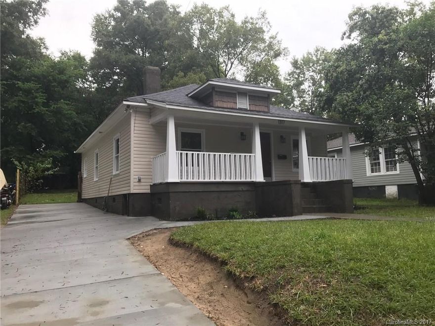 Beautifully restored bungalow in the midst of the Belmont revival and just blocks from Plaza Midwood. This classic 1920s mill bungalow has been updated to please today's homeowner while retaining the original character and charm of the past. Enjoy a modern kitchen with granite counter tops and stainless steel appliances  Fresh paint throughout. New concrete driveway. Large, fenced backyard. The home features two full bathrooms and three fireplaces.