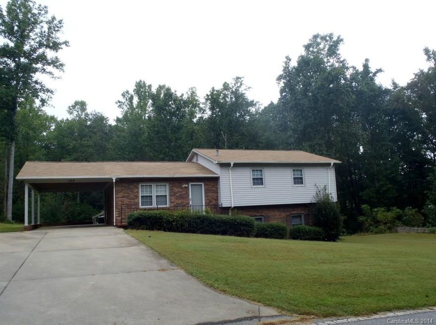 Beautiful home in the W Iredell Disctrict. Home has tile floors in the kitchen and main bath, and wood floors throughout the rest of the home. Garage is in the basement.