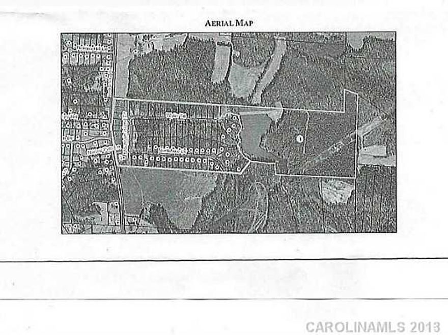 64 developed single family Residential home sites (including 6 waterfront sites). Great opportunity for a builder/developer. 1/2 acre to 1 acre sites. Pool and Clubhouse already built.