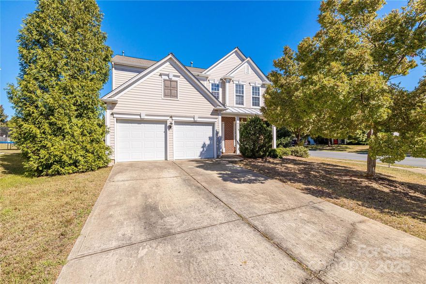 Charming 2-story home in Arbor Hills with 1,934 sq ft, 4 beds, 2.5 baths, and a 2-car garage. Built in 2004, this home features a new roof (2021) and HVAC system (2021), a welcoming front porch, flat backyard, and a bright 2-story foyer. The formal dining room connects to a kitchen with stainless steel appliances and a newer microwave (8/2023). Enjoy a spacious family room with a fireplace. Upstairs offers a vaulted-ceiling primary suite with a garden tub, stand-in shower, plus 3 secondary bedrooms, a full hallway bath, and a laundry area with a newer washer (2/2023). Conveniently located near TIAA-CREF, Wells Fargo CIC, UNCC, Trader Joe’s, and major highways (I-485, I-85, I-77). Community amenities include a pool, clubhouse, tennis courts, and playground.